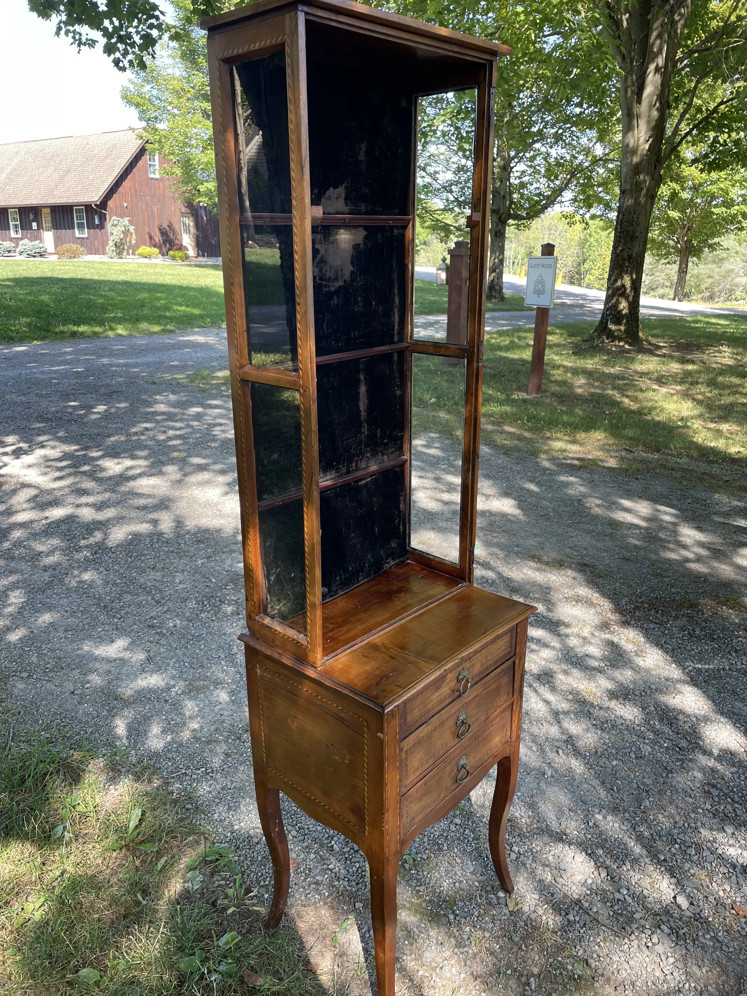 French provincial neoclassical display cabinet (vitrine?) on cabinet in cherry with chevron inlay, c.1790s.