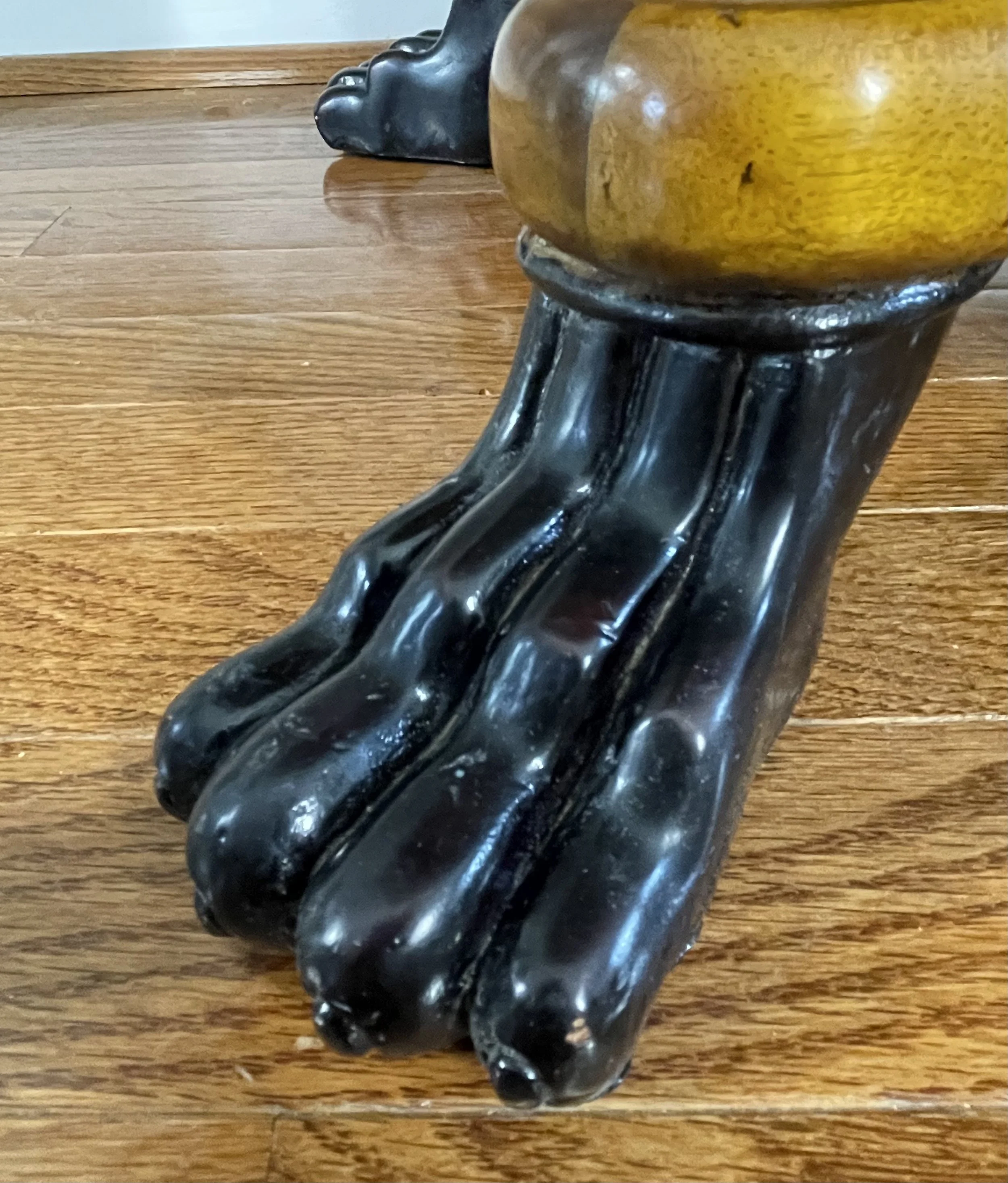 These are ebonized carved wood. Outstanding craftsmanship. 