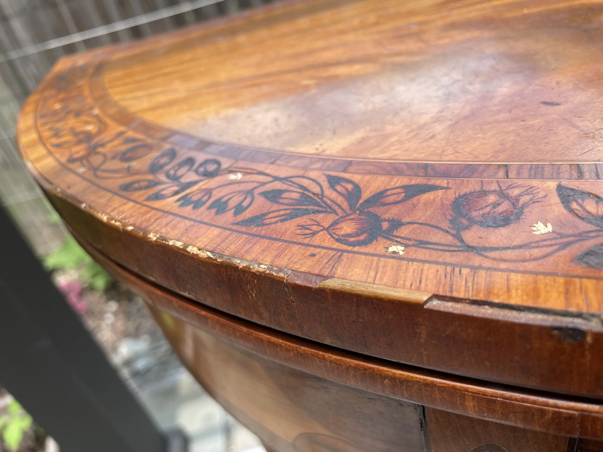 Missing veneer, string molding. 