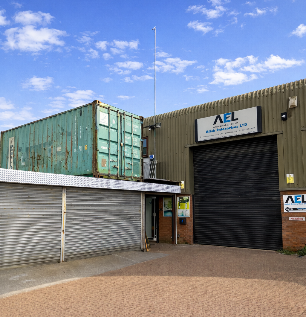 AEL Plastics warehouse unit with roller shutter and company signage