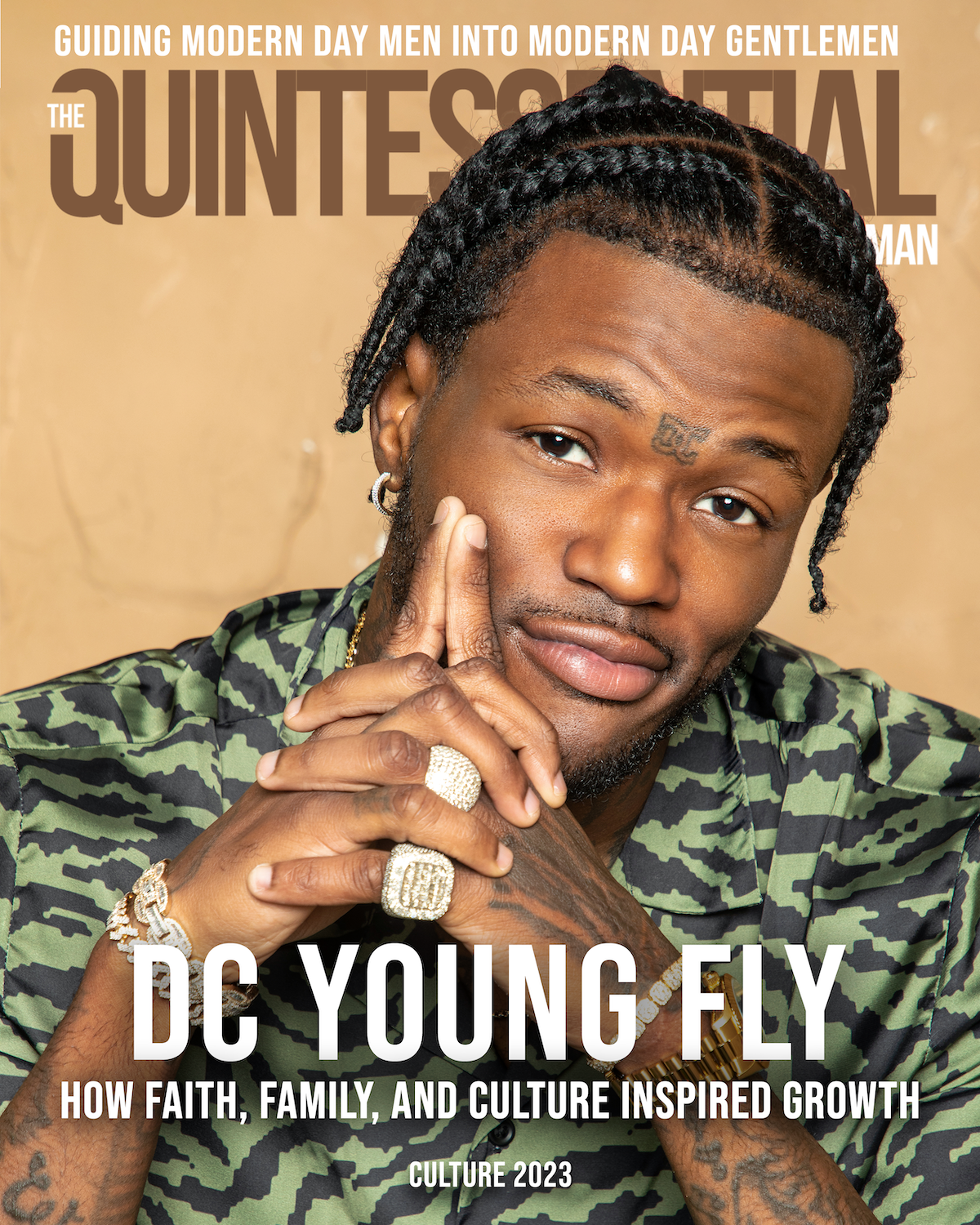 Cover of a magazine featuring DC Young Fly with a camouflage shirt, multiple rings, and jewelry. The magazine title is 'The Quintessential Man' and includes headlines about guiding modern men, faith, family, and culture.