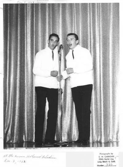 Ernie Bringas and Phil Stewart, the original founding Rip Chords, on stage at the Palladium.