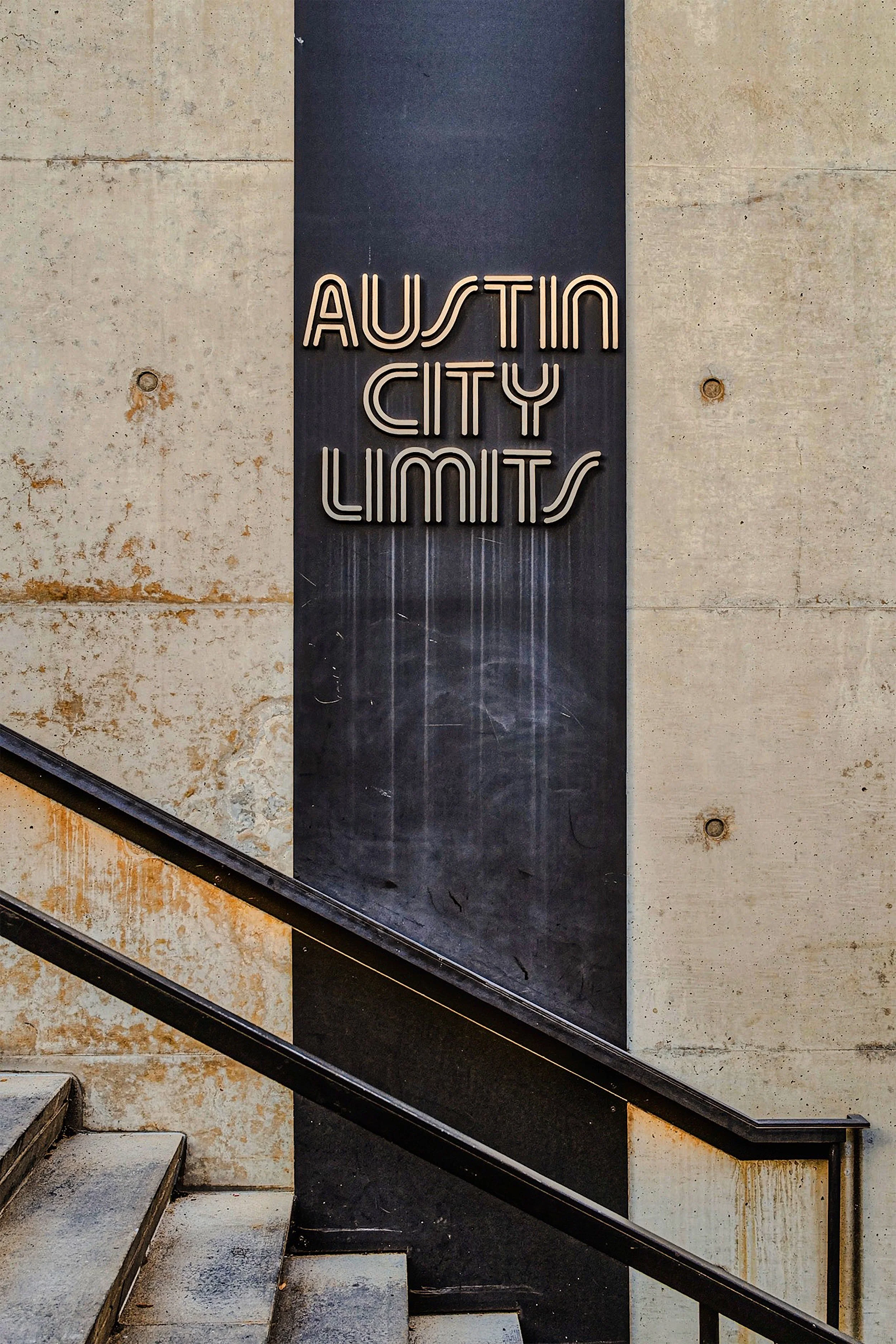 Austin City Limits' sign with stairwell