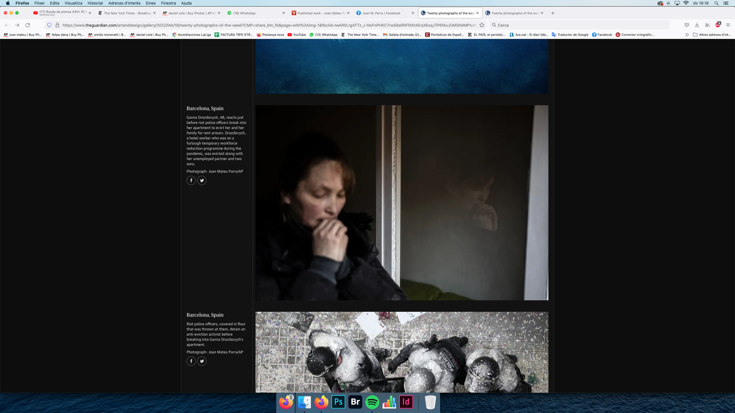 A woman with short hair, wearing dark clothing, appears distressed or contemplative, sitting with her hand near her mouth, looking downward. Her reflection can be seen in a mirror or window beside her.