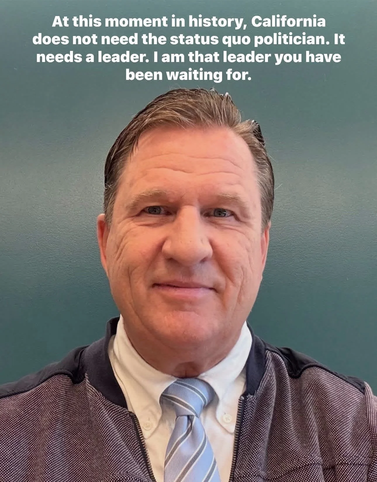 A man in a suit and striped tie standing in front of a teal background, with a quote about leadership and California written at the top.
