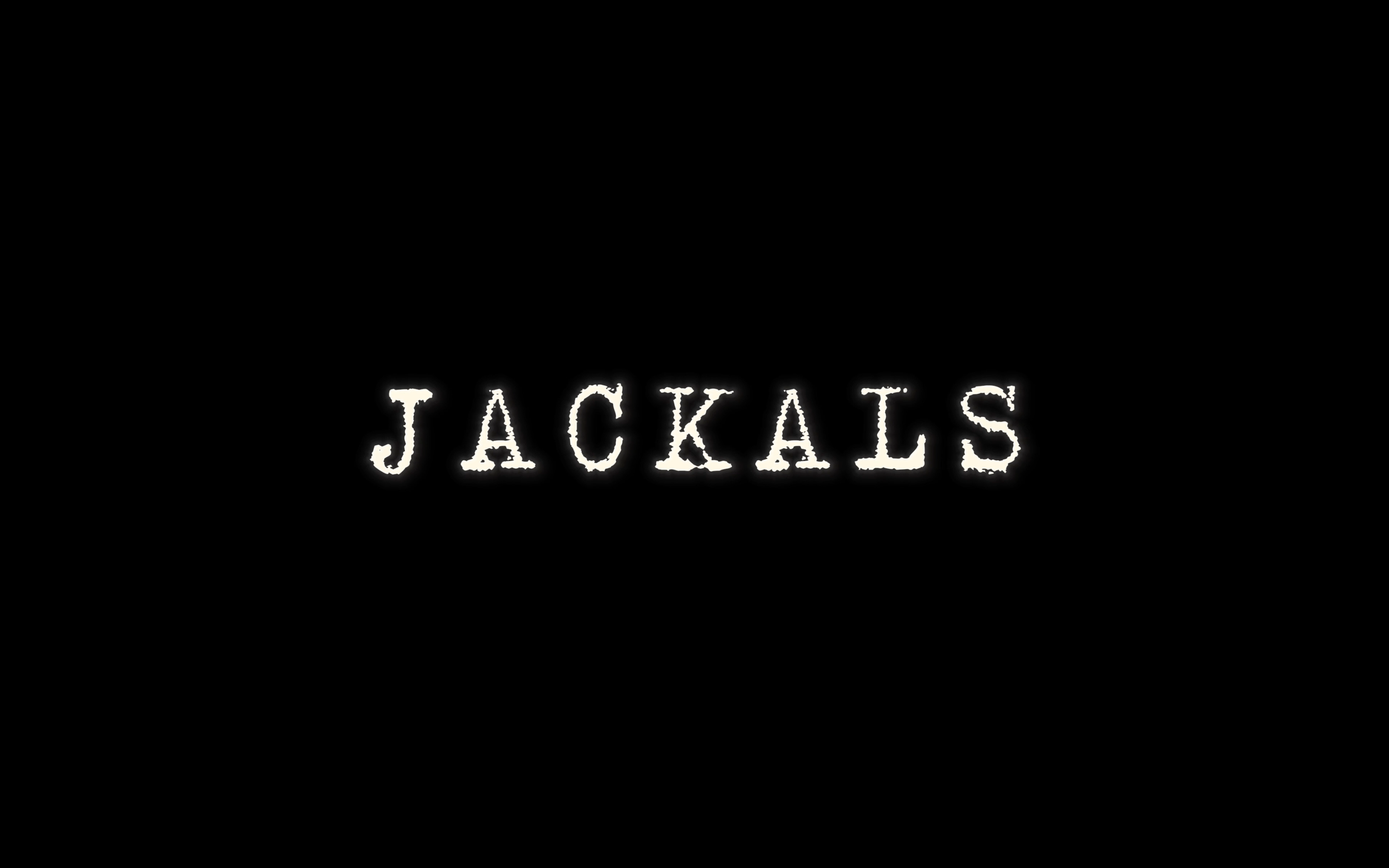 Black background with the word 'JACKALS' in white, distressed font.