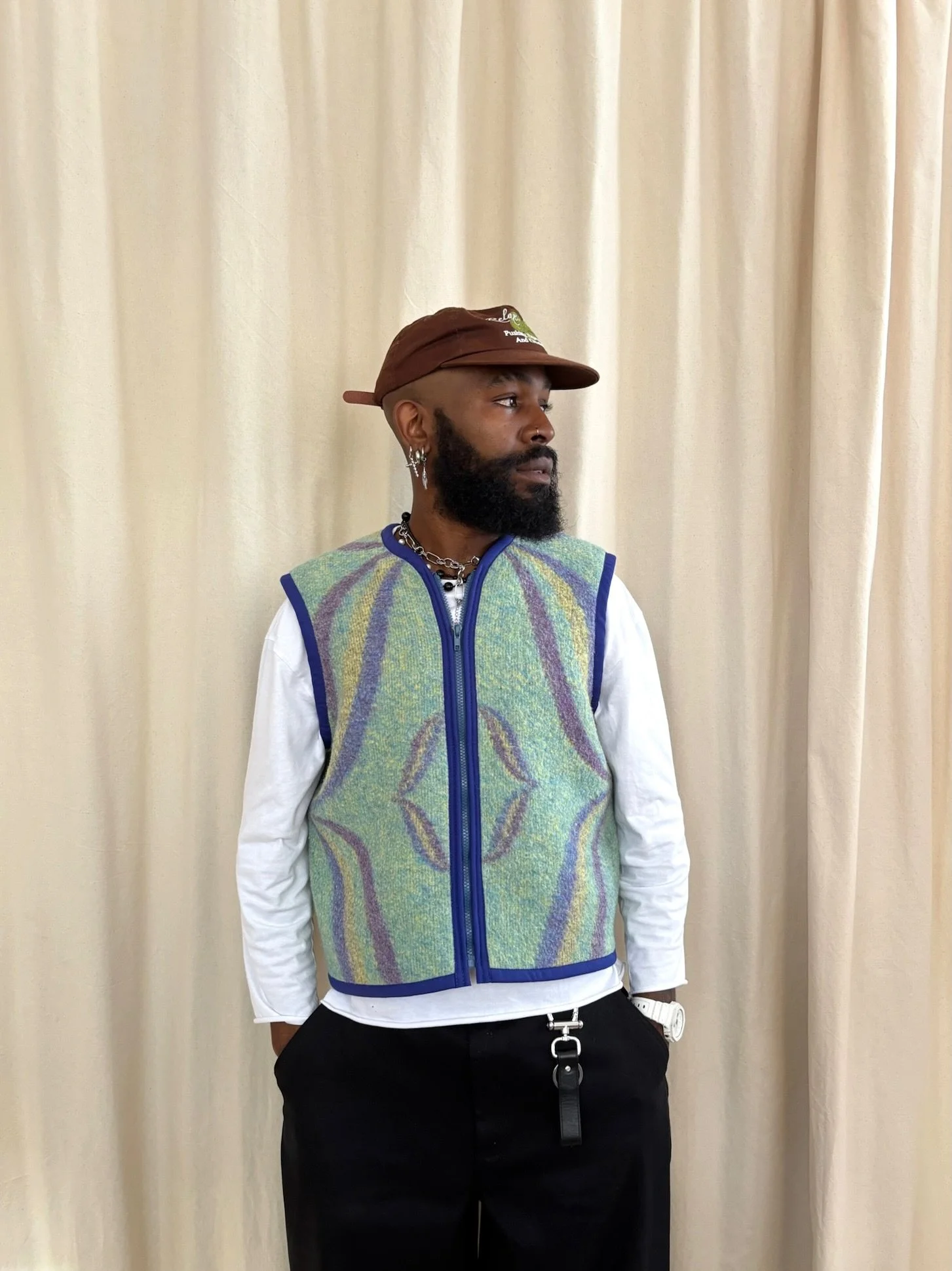 Gilet sans manche - vert clair et mauve à motifs