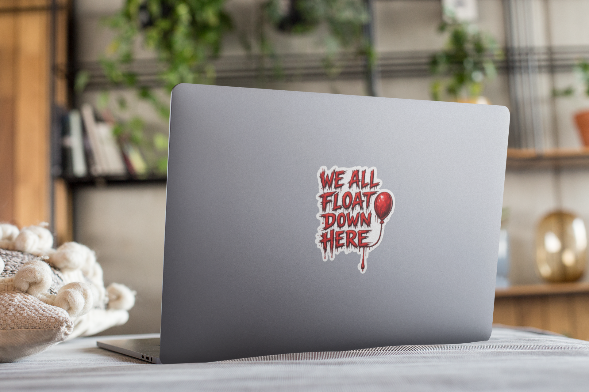 decal-mockup-featuring-a-laptop-standing-on-a-table-25200.png