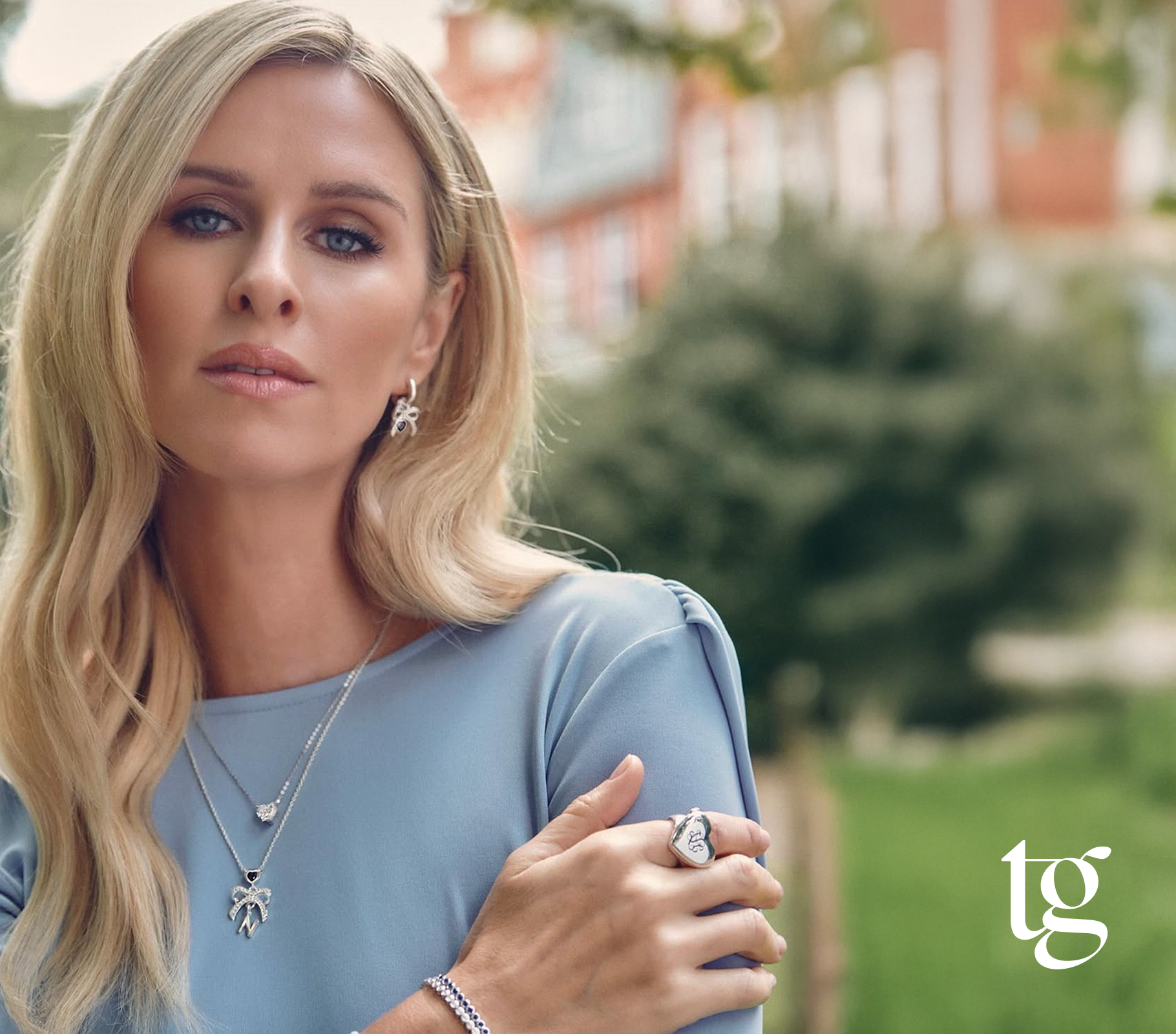 Theo Grace by Nicky Hilton fashion jewellery branding and website design, featuring a modern black and blue visual identity with editorial styling.