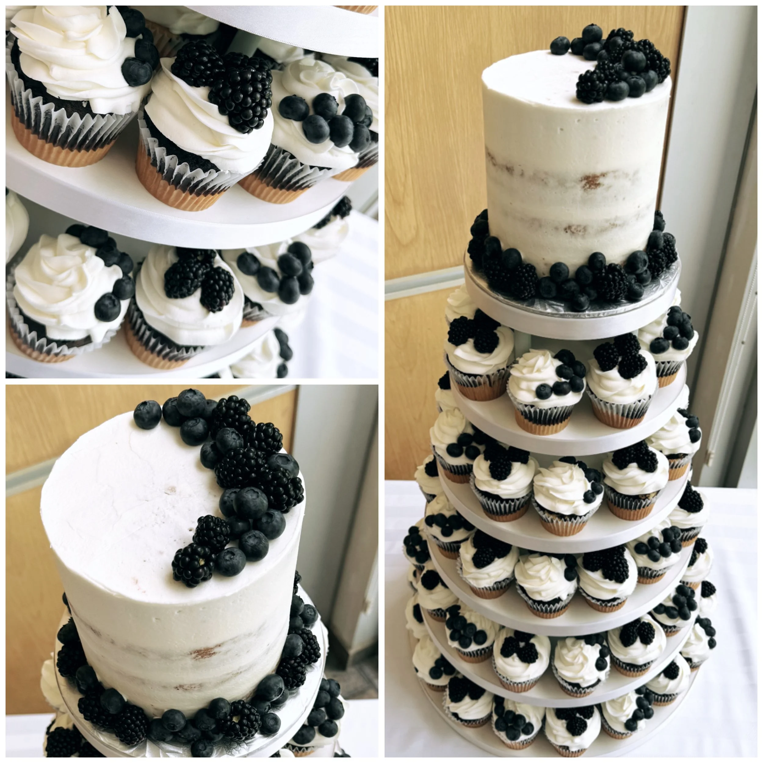 Multi-tiered cupcake stand with vanilla cupcakes topped with blackberries and blueberries, and a tall semi-naked cake with blackberries and blueberries around the base and on top.