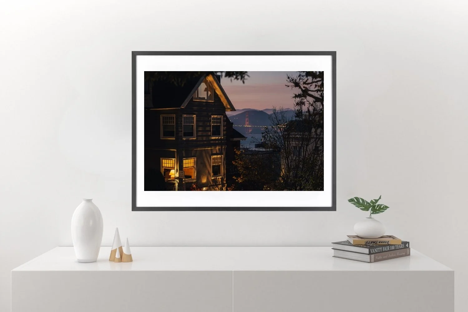 Wall display House at night lamp in the window.