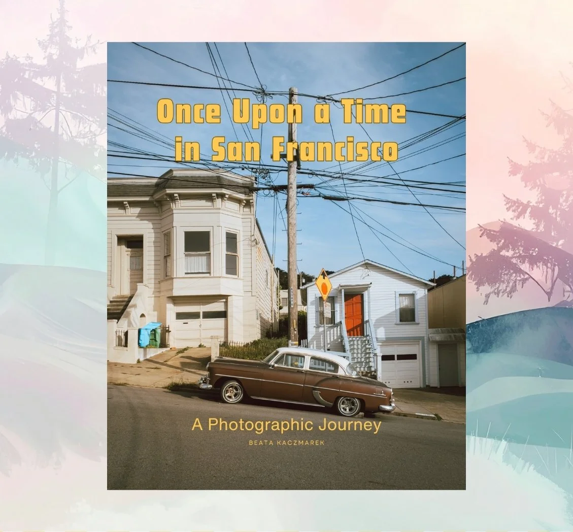 The front cover of the photo book showing a car parked on a hill in front of houses