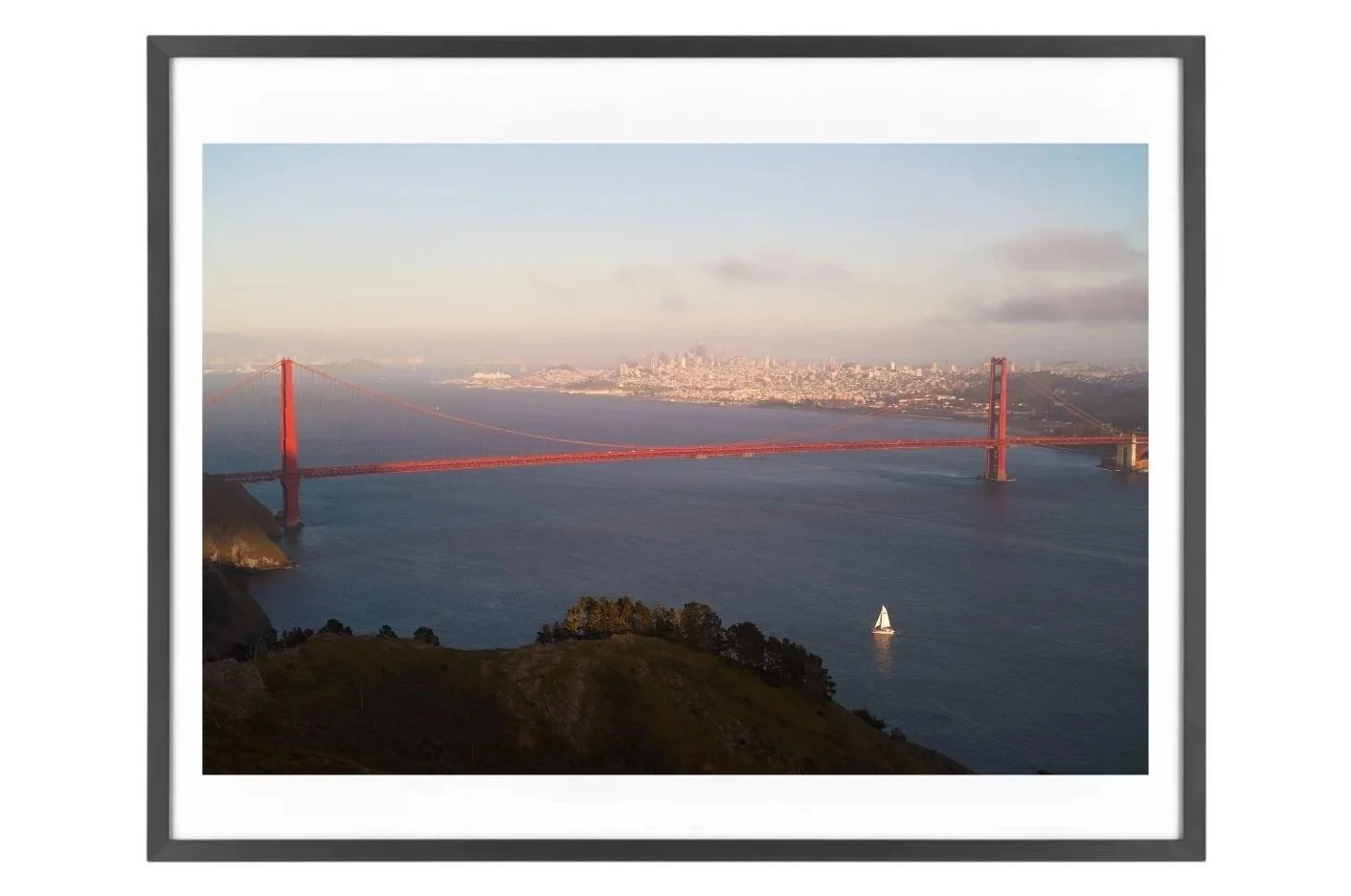 A white boat under Golden Gate Bridge
