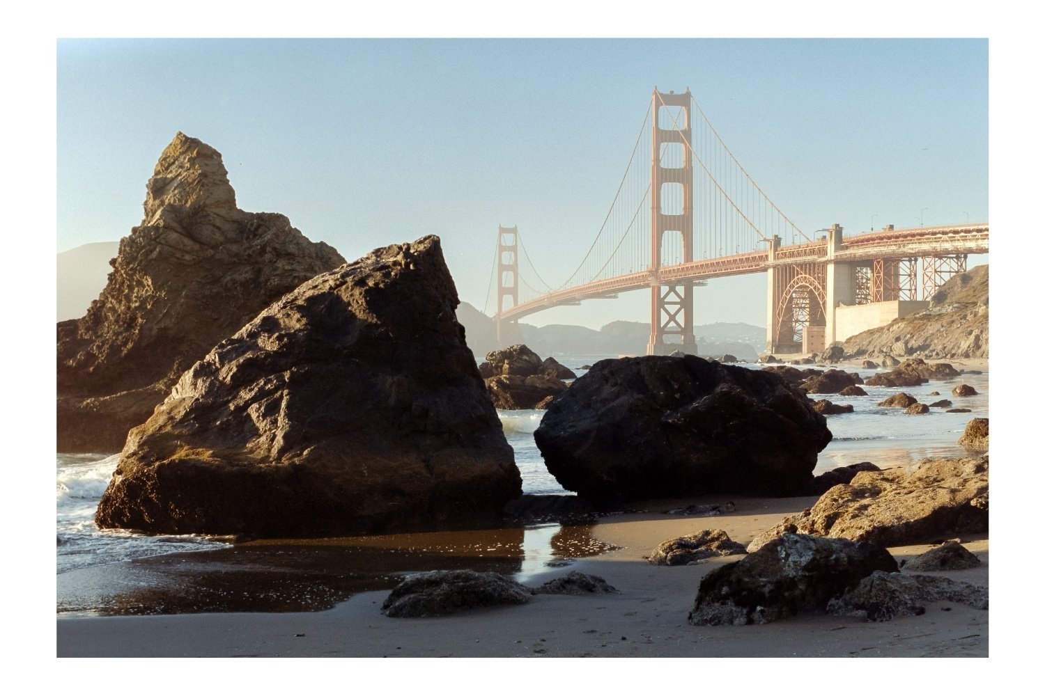 Marshall's Beach, rocks in the foreground, Golden Gate Bridge in the background