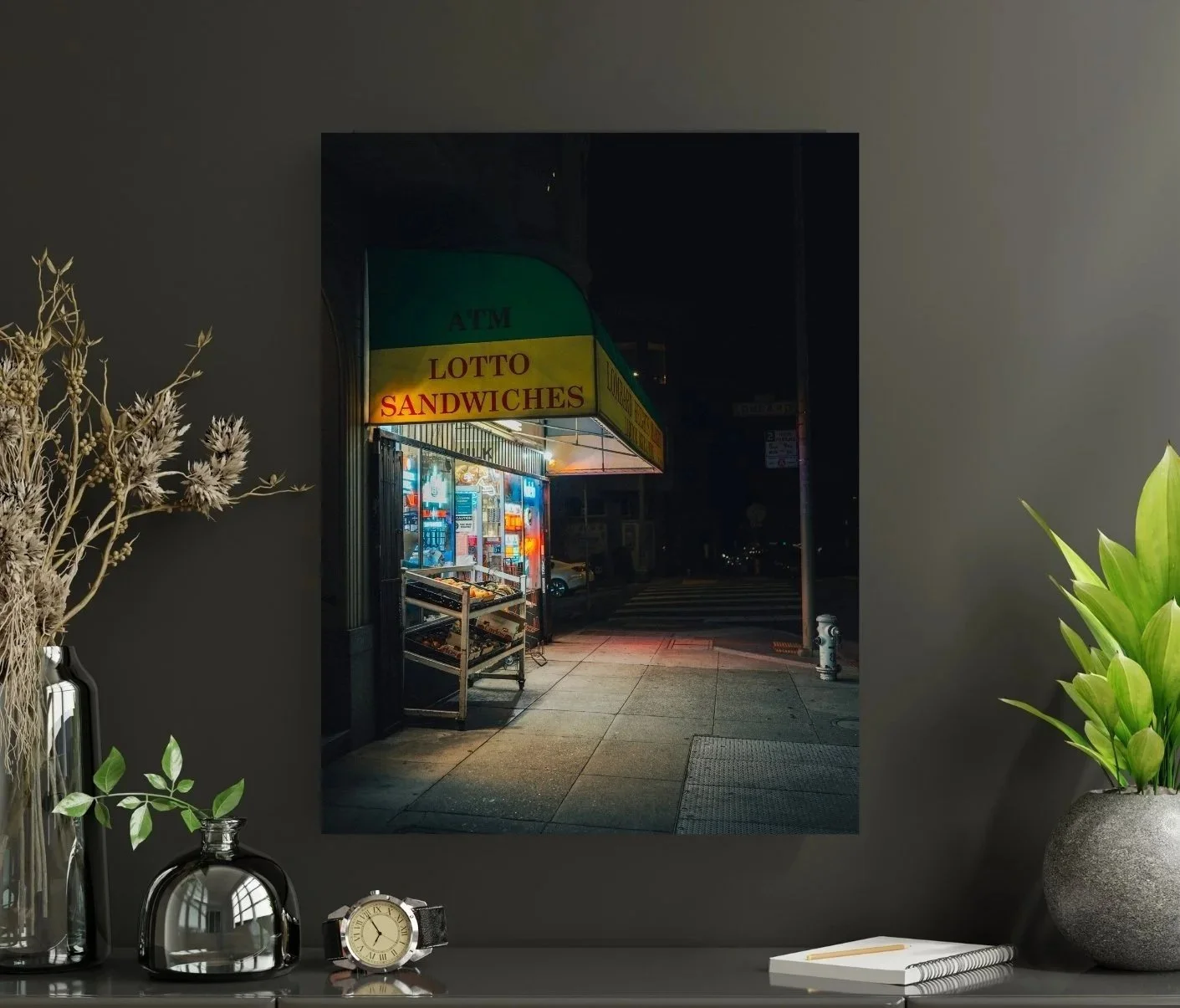 Night view of a grocery store on a North Beach street corner, glowing with colorful lights against the dark surroundings.