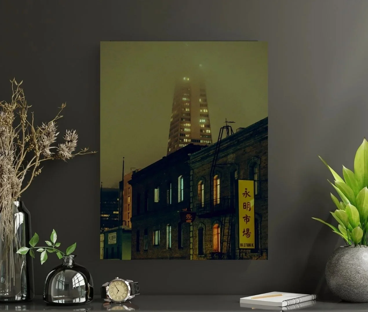 Foggy night in Chinatown, San Francisco, with orange-lit fog, old brick building, and Transamerica Pyramid partly obscured.