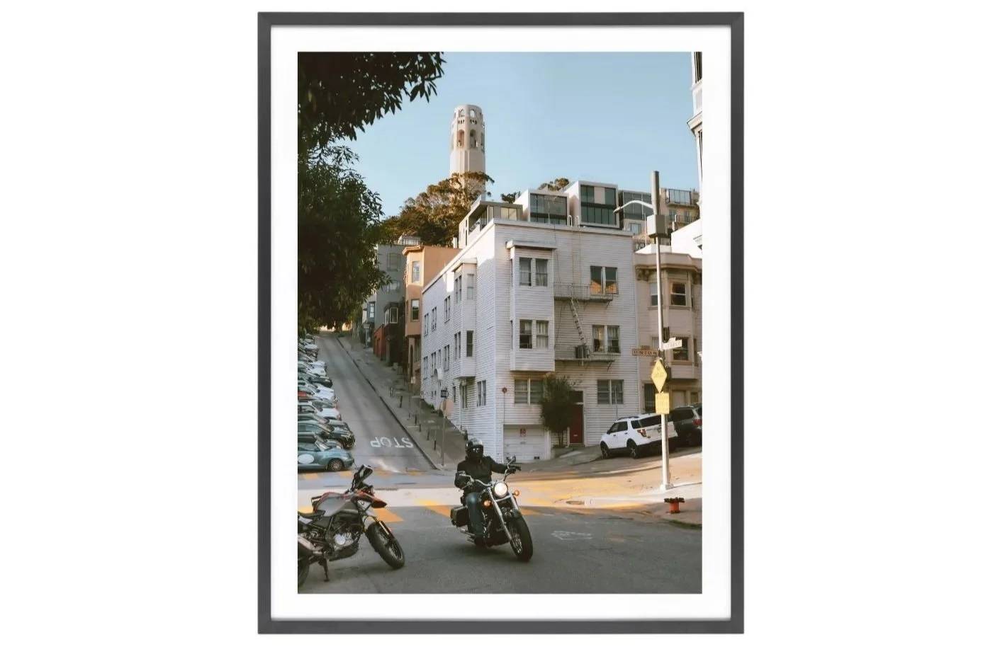 North Beach photo, a motorcycle riding, Coit Tower in the background