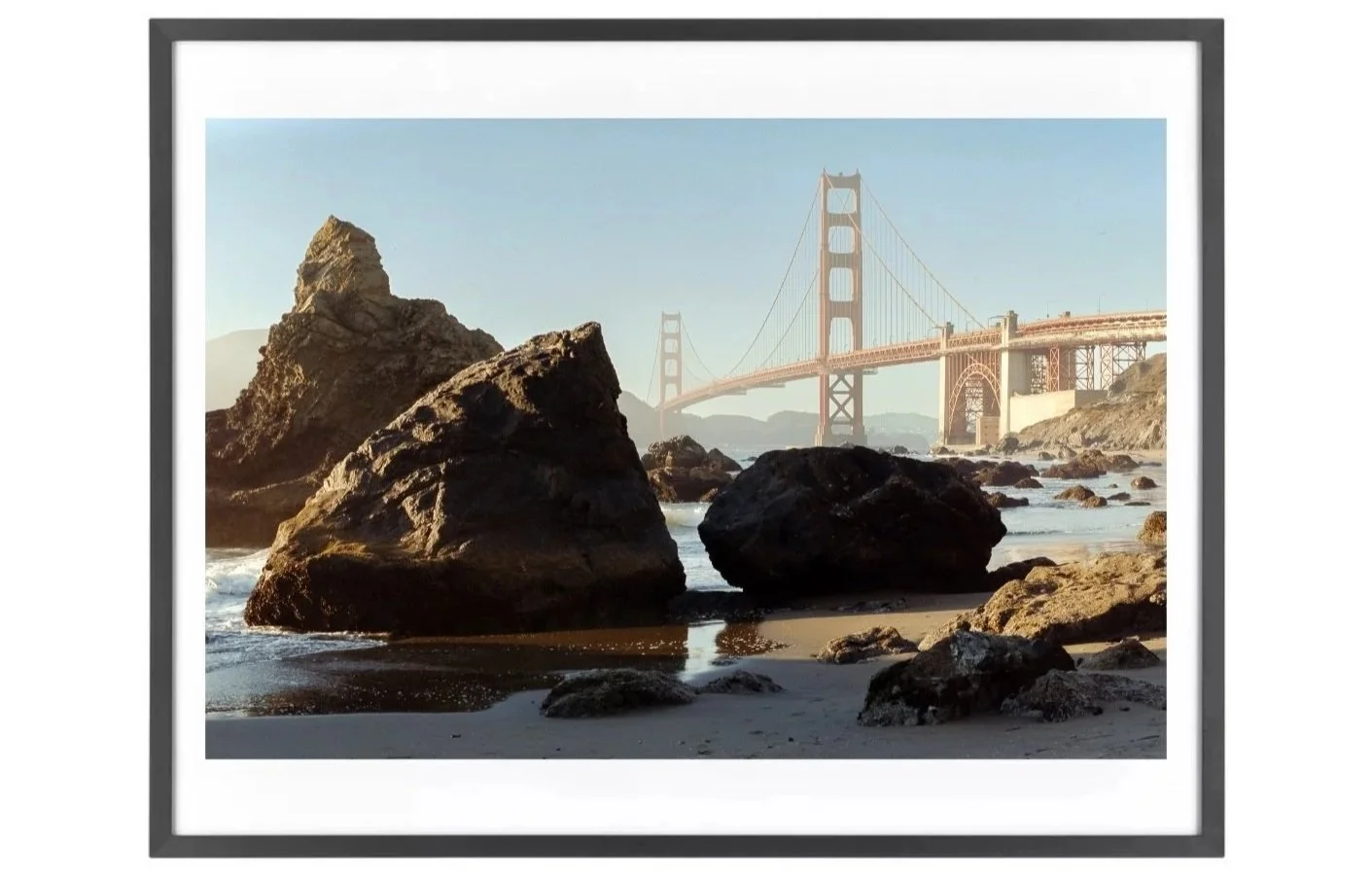 Rocks at the beach and the bridge