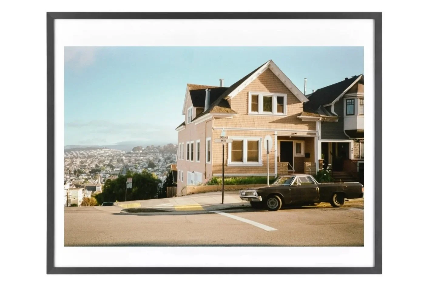 Chevrolet El Camino On The Hill and a house