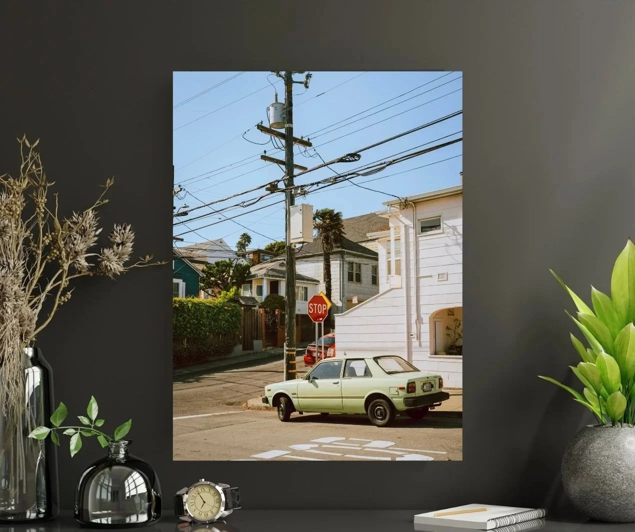 Photographic print of an older car parked at a quiet Bernal Heights intersection with a street rising uphill.
