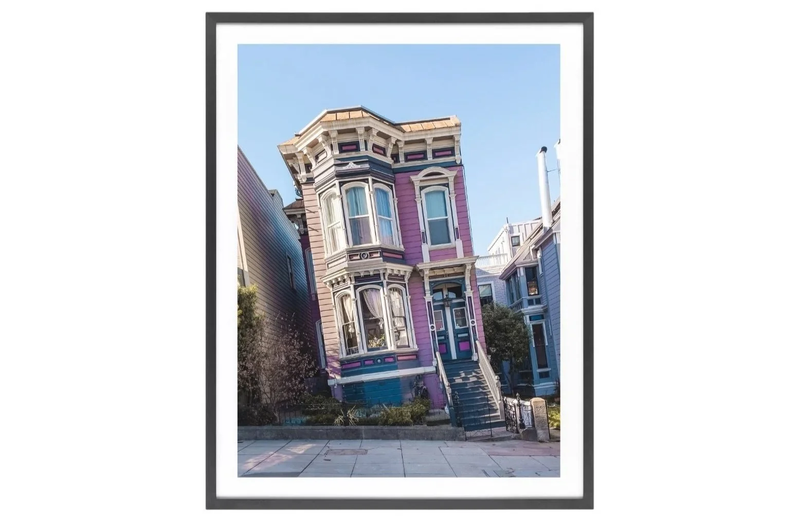 Purple house leaning Victorian house