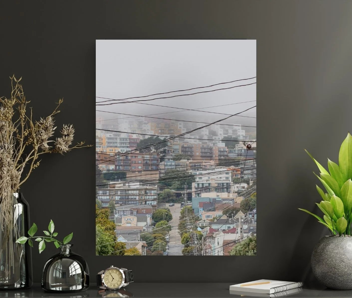 Hills with houses behind fog