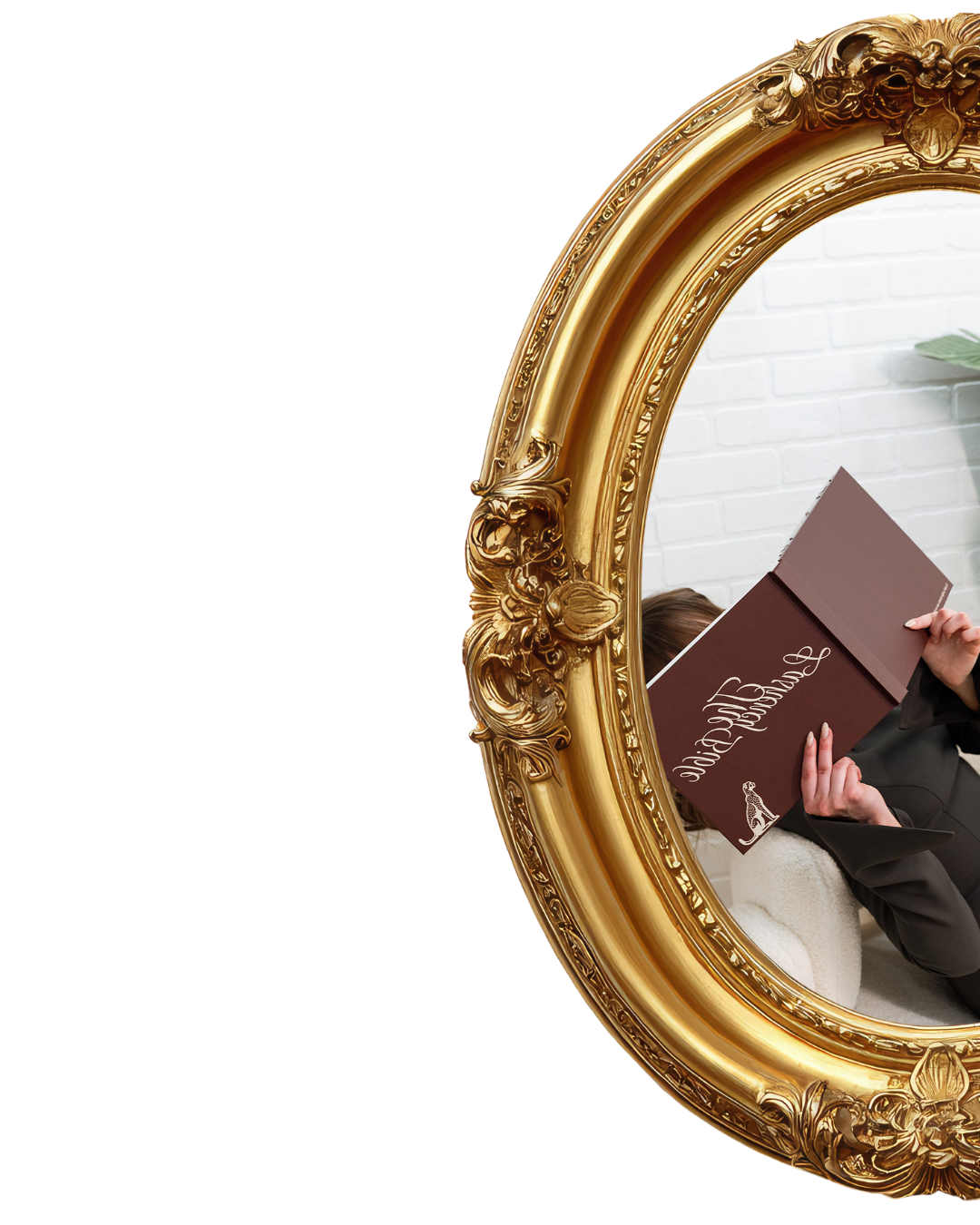 Person in black jacket holding a menu reflected in a large ornate gold mirror, with white brick wall and green plant in the background.