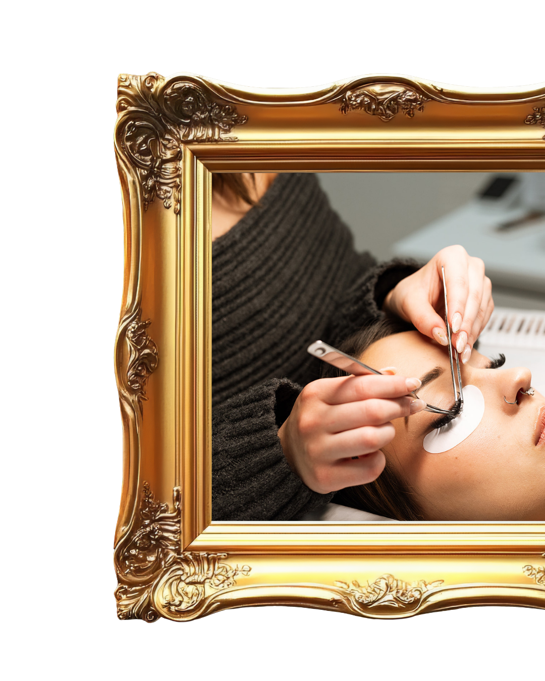 A person receiving eyelash extensions while lying down, with a beautician applying lashes with tweezers, seen through an ornate gold picture frame.