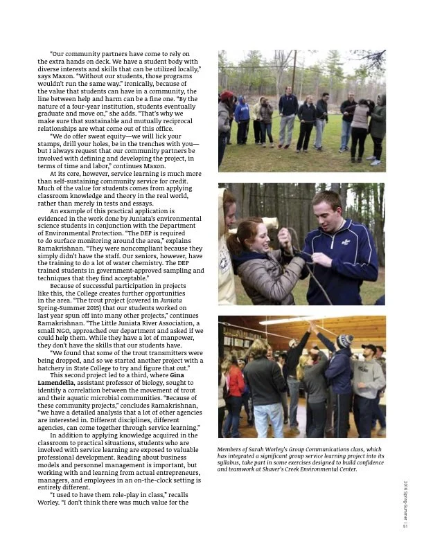 A group of people participating in an outdoor team-building exercise in a wooded area, holding hands in a circle. Feature article news writing reporting creative writing.