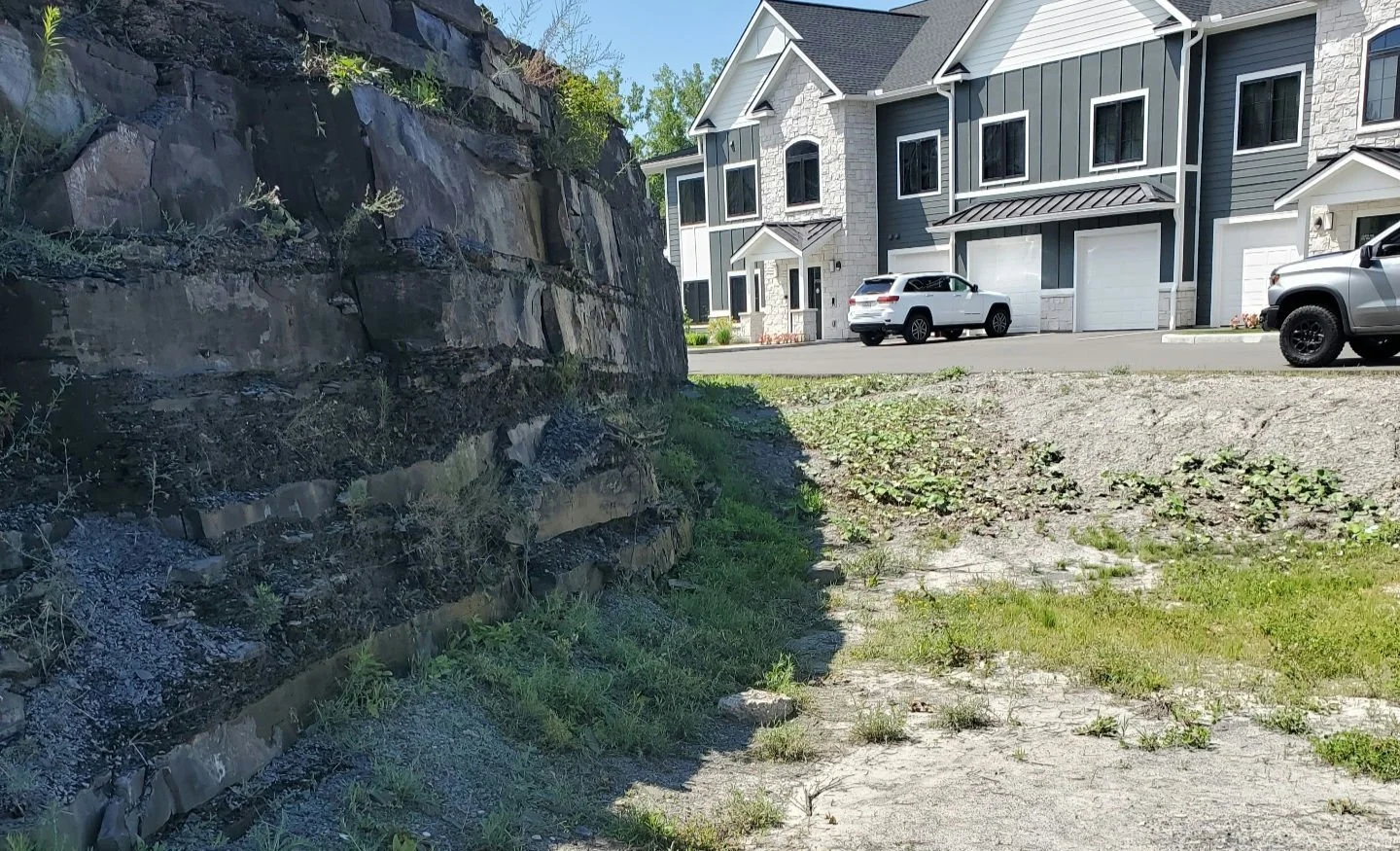 Before image of pond build site at New York apartments.jpg