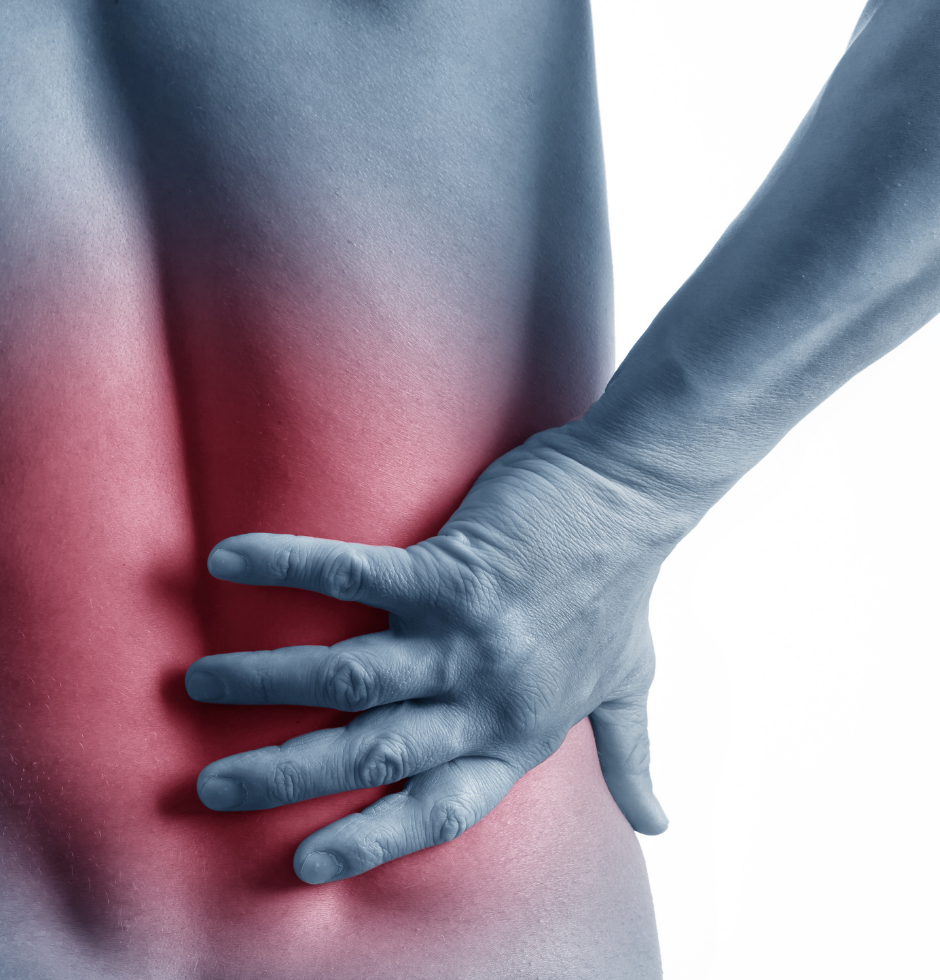 A person with their hand on their lower back, which appears to be sore or in pain, with a color overlay highlighting the pain area.