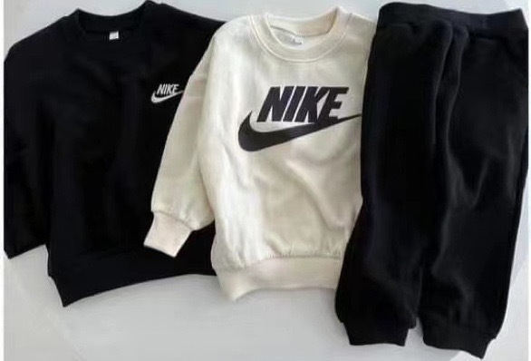 Black Nike Jogging Suit.png