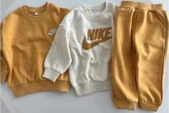 Brown Nike Jogging Suit.png