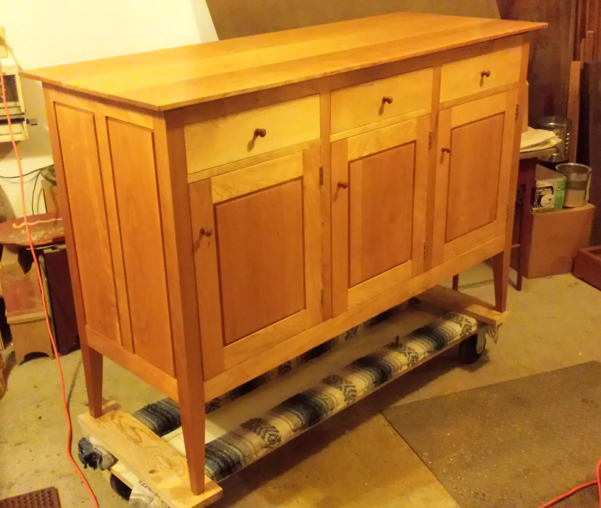 shaker buffet made from cherry three drawers and three doors