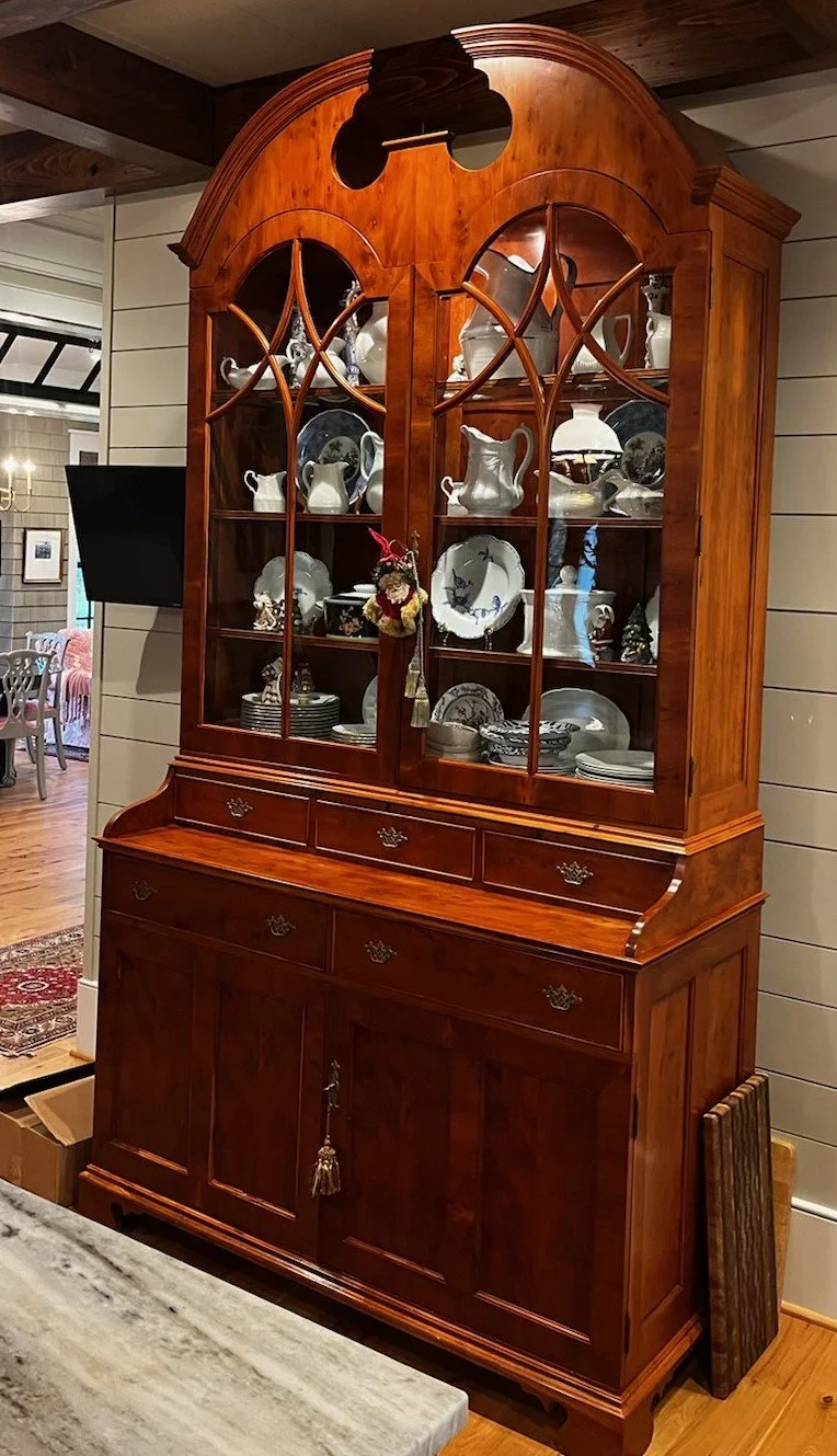 handcrafted step back hutch in english yew with tombstone glass doors