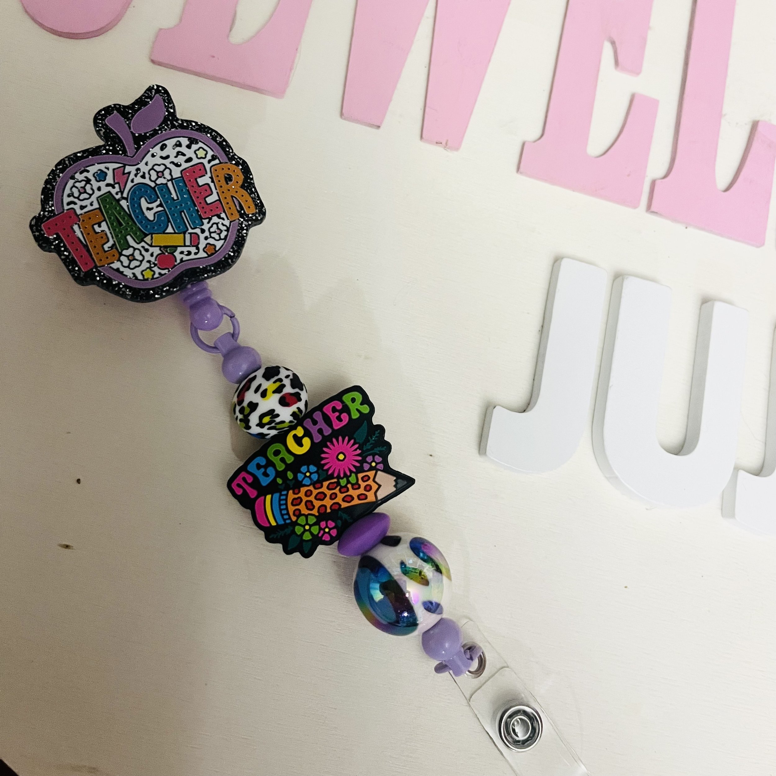 Colorful Teacher Apple Badge Reel