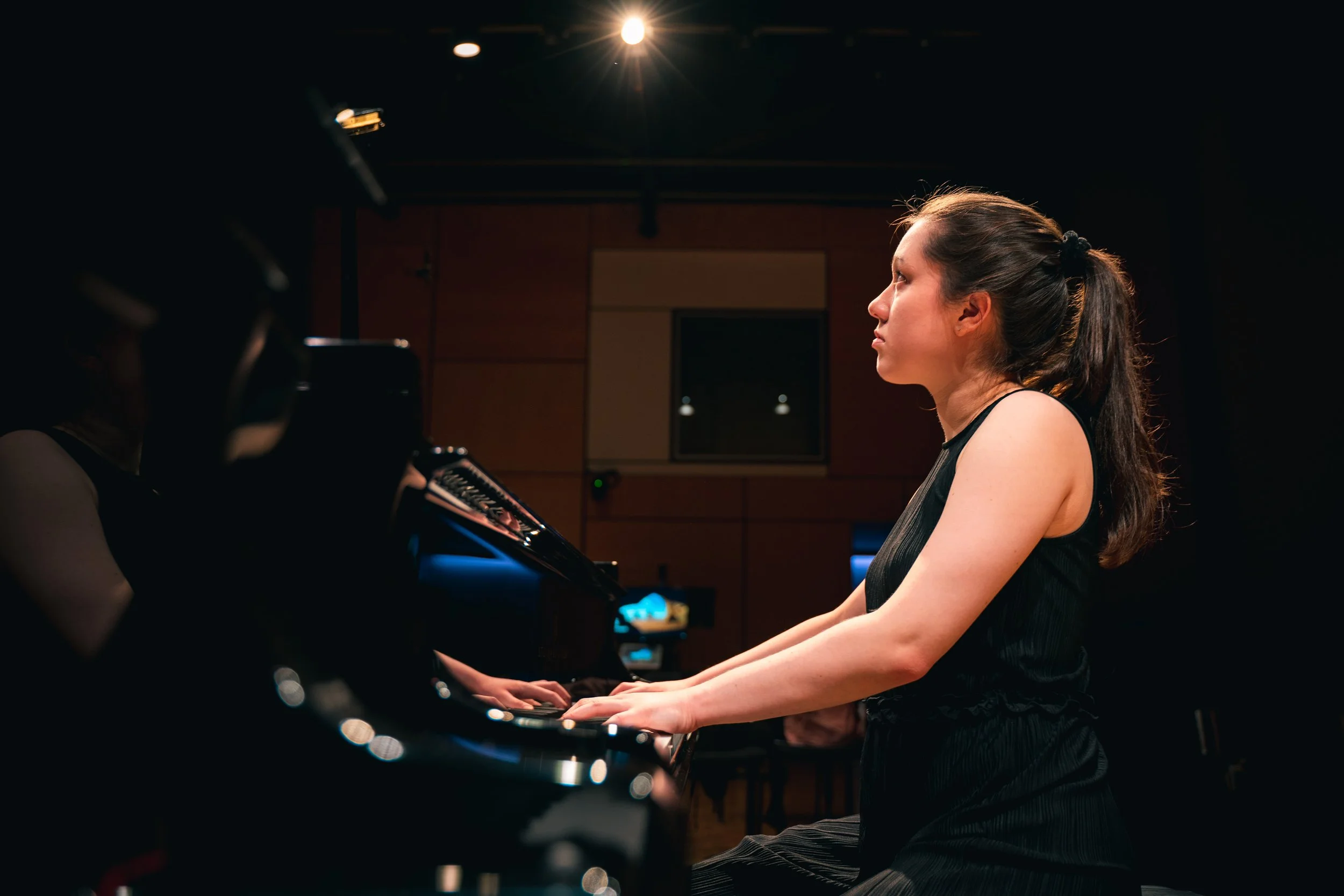 Tiffany Buxton giving a piano recital in the Carole Nash Recital Room at the Royal Northern College of Music