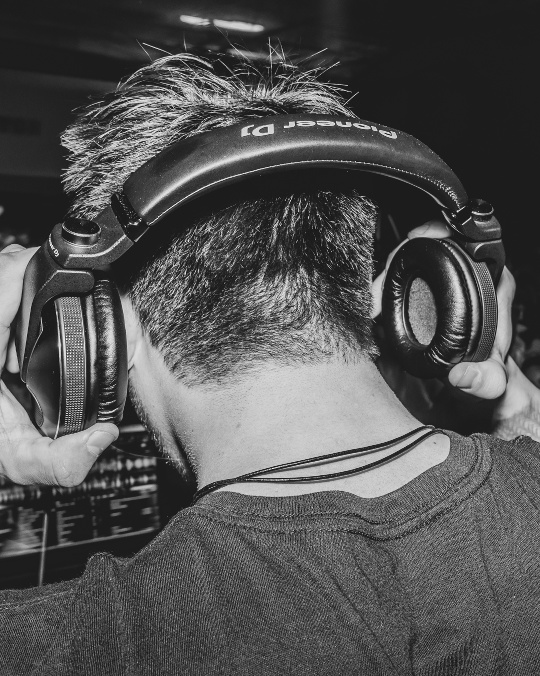 Man putting on headphones