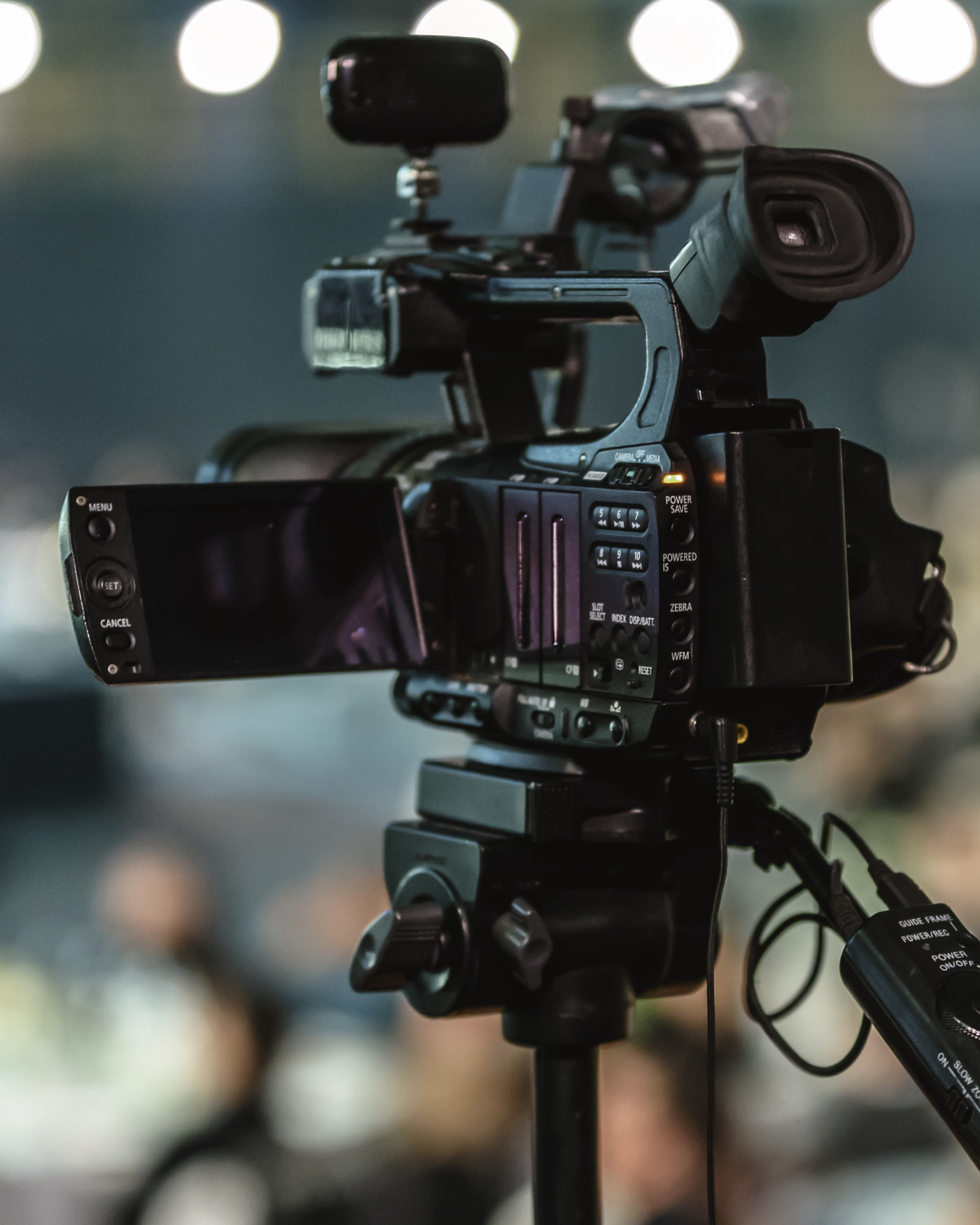 Digital video camera on a tripod