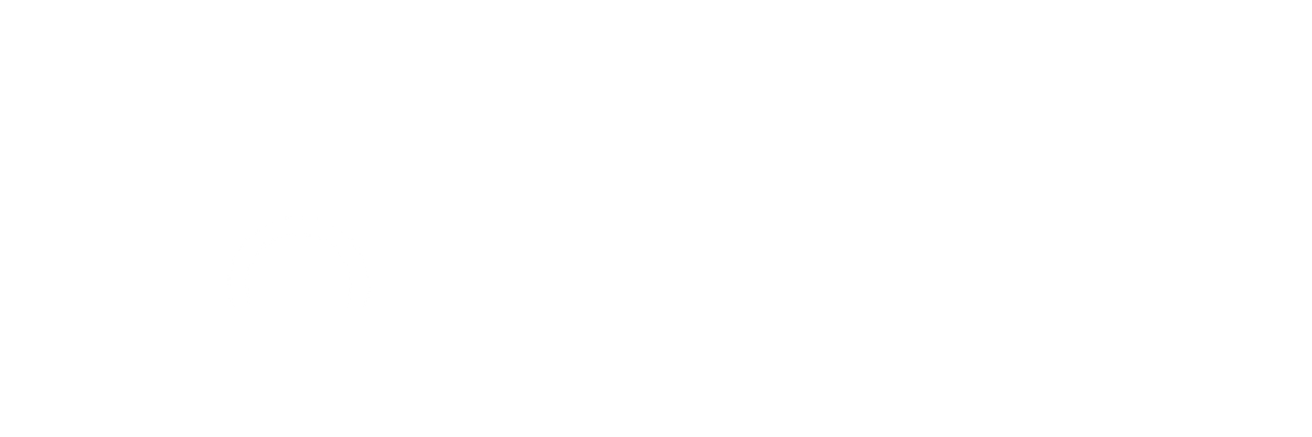 Modern floral installation featuring artichokes and tapered candles, composed as floral artistry for an editorial-style setting.