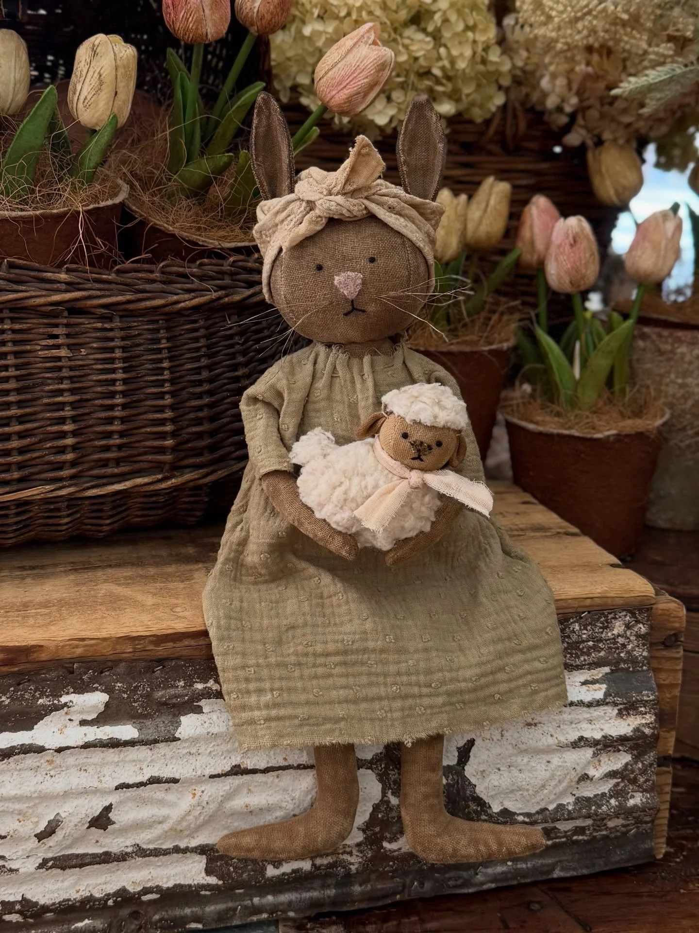 Meet Lydia ~ my springtime bunny with her lamb friend! 🐑 I&rsquo;ve made several for my next website restock on March 21 at noon EST! www.primitivepigfolkart.com 
&nbsp;
Lydia&rsquo;s dress is made of a sweet sage green cotton and she wears a floral