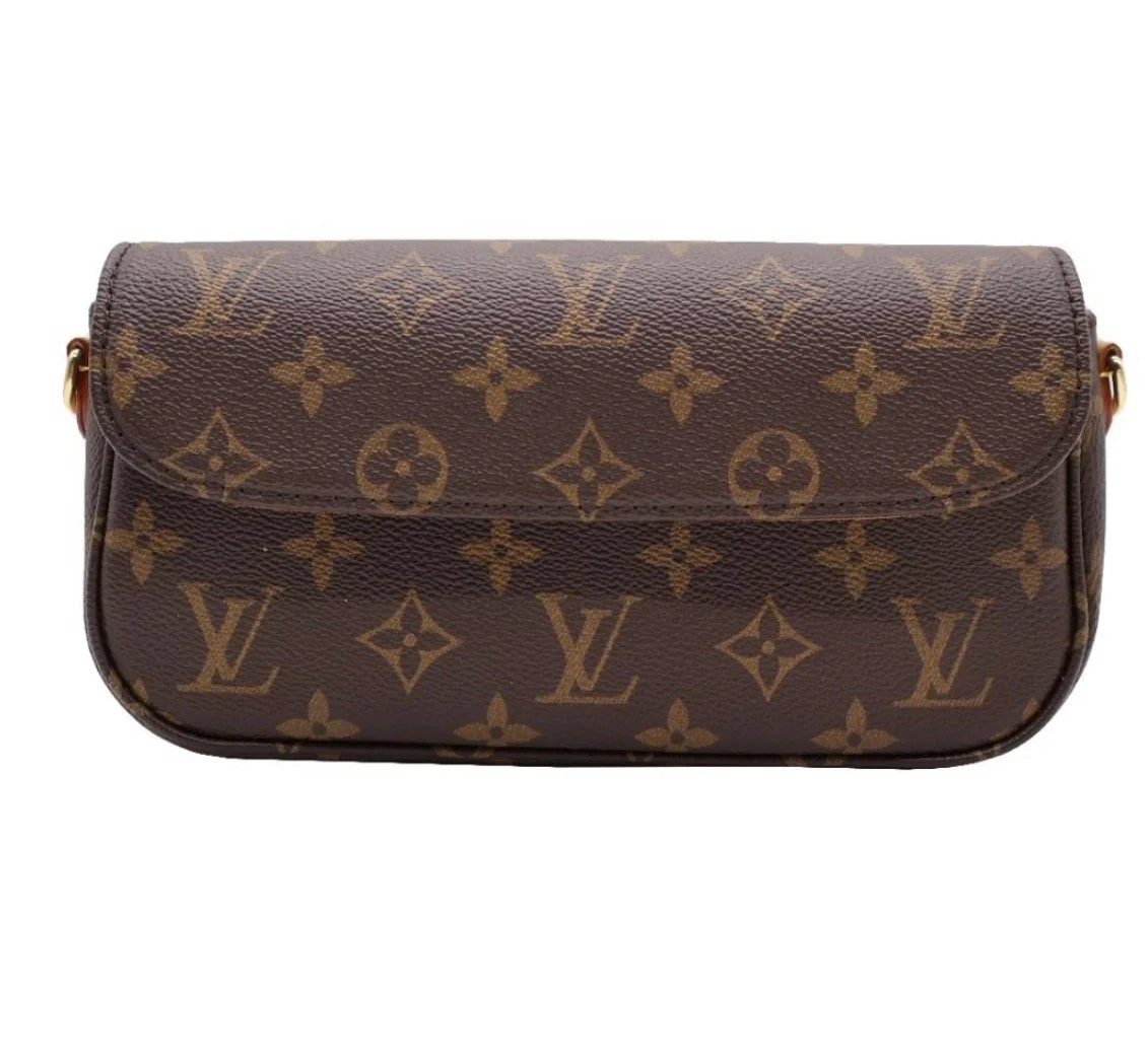 A Louis Vuitton monogram canvas clutch purse with a brown and gold pattern.