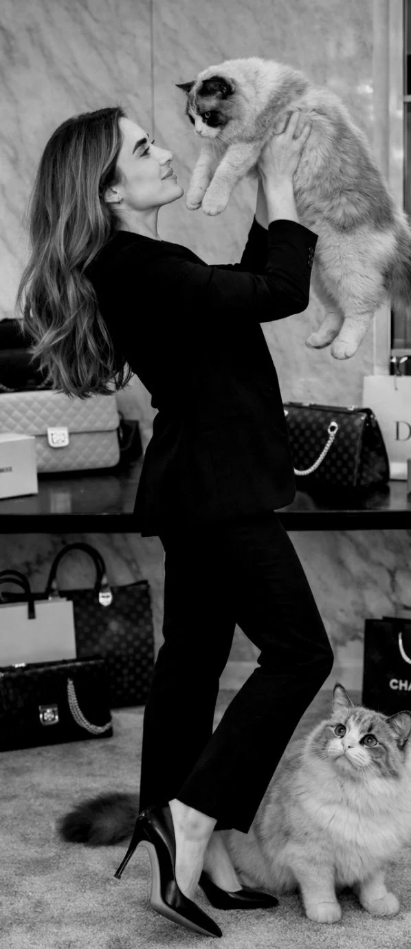 Founder of The Muse Edit, D, photographed with her cats