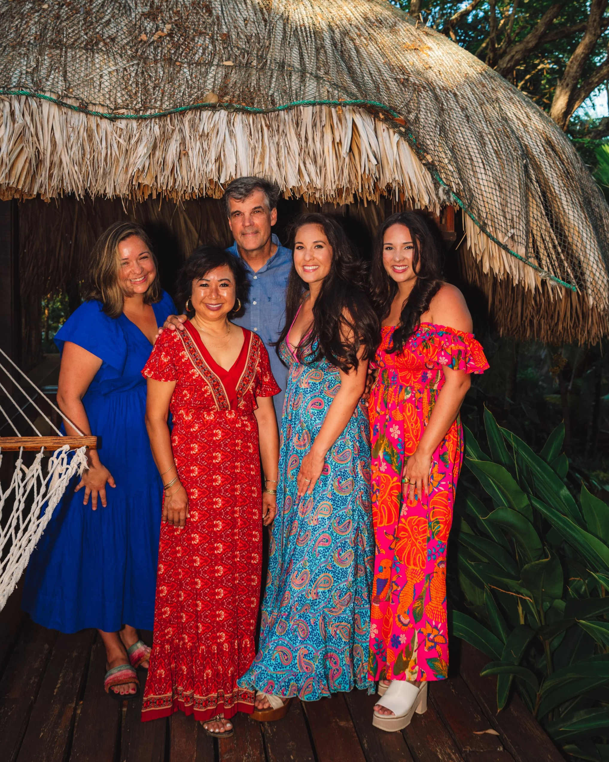 Joe and Thuy with their three daughters, Stephanie, Alexandra, and Victoria
