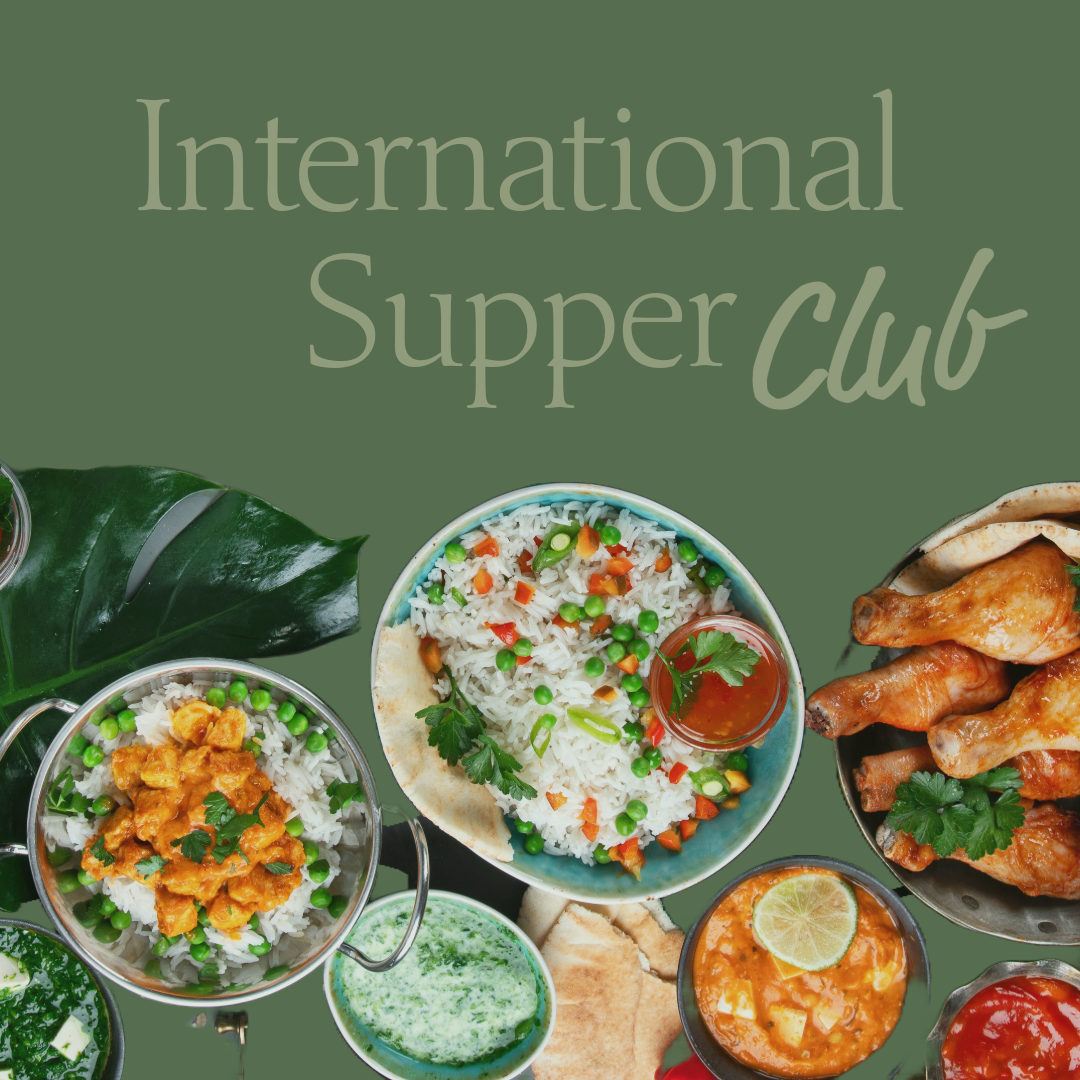 Spread of Indian dishes including rice, curry, chicken, and sauces at an International Supper Club event.