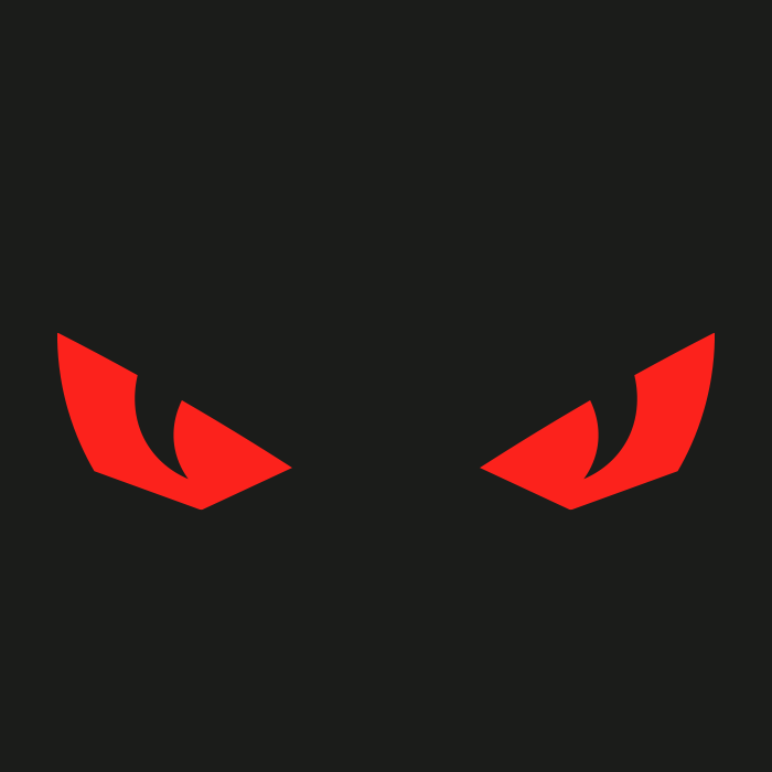 Close-up of a face with glowing red eyes on a black background, resembling a menacing or villainous character.