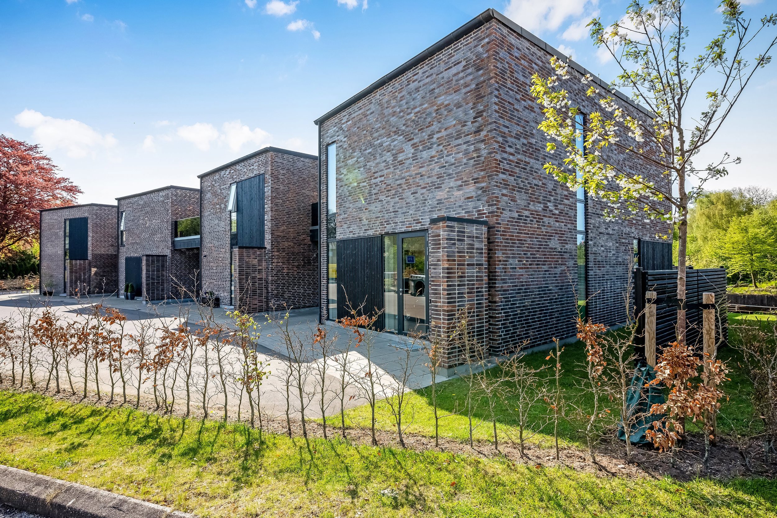  
Åhusene Østerbrogade - 4 byhuse
  
Modtager af "ROSENDE OMTALE" AF  BYG & LAND. 
  
Privat bygherre.