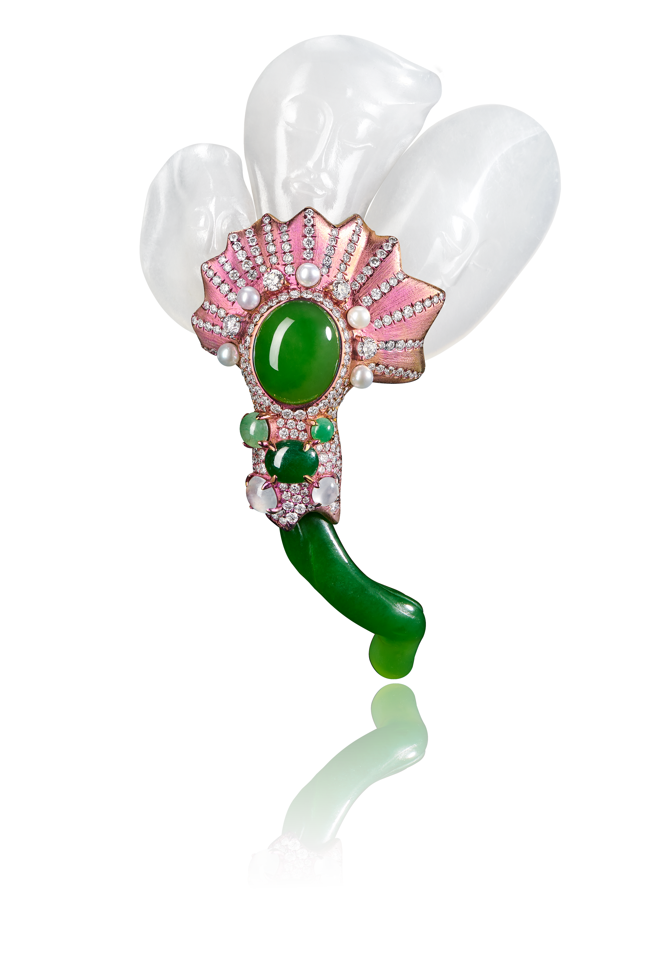 A brooch in the shape of a banana leaf, crafted from white Hetian jade. It features three leaves, each carved with the face of Buddha. The piece is set with a piece of Hetian jadeite and diamonds, while the main stem is constructed from pink titanium