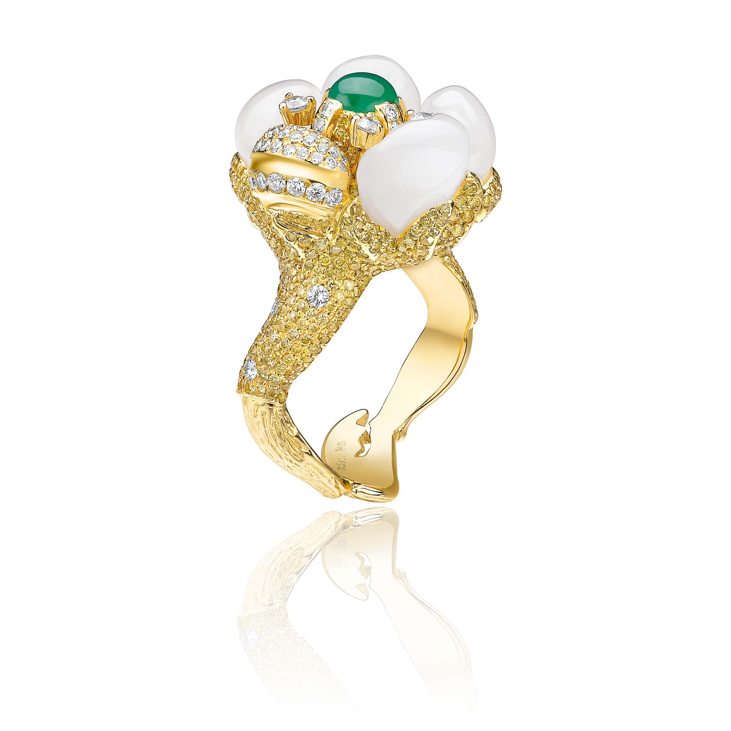 A gold ring featuring a floral motif on the crown, with a textured band set with diamonds, and topped with white Hetian jade and green jadeite.