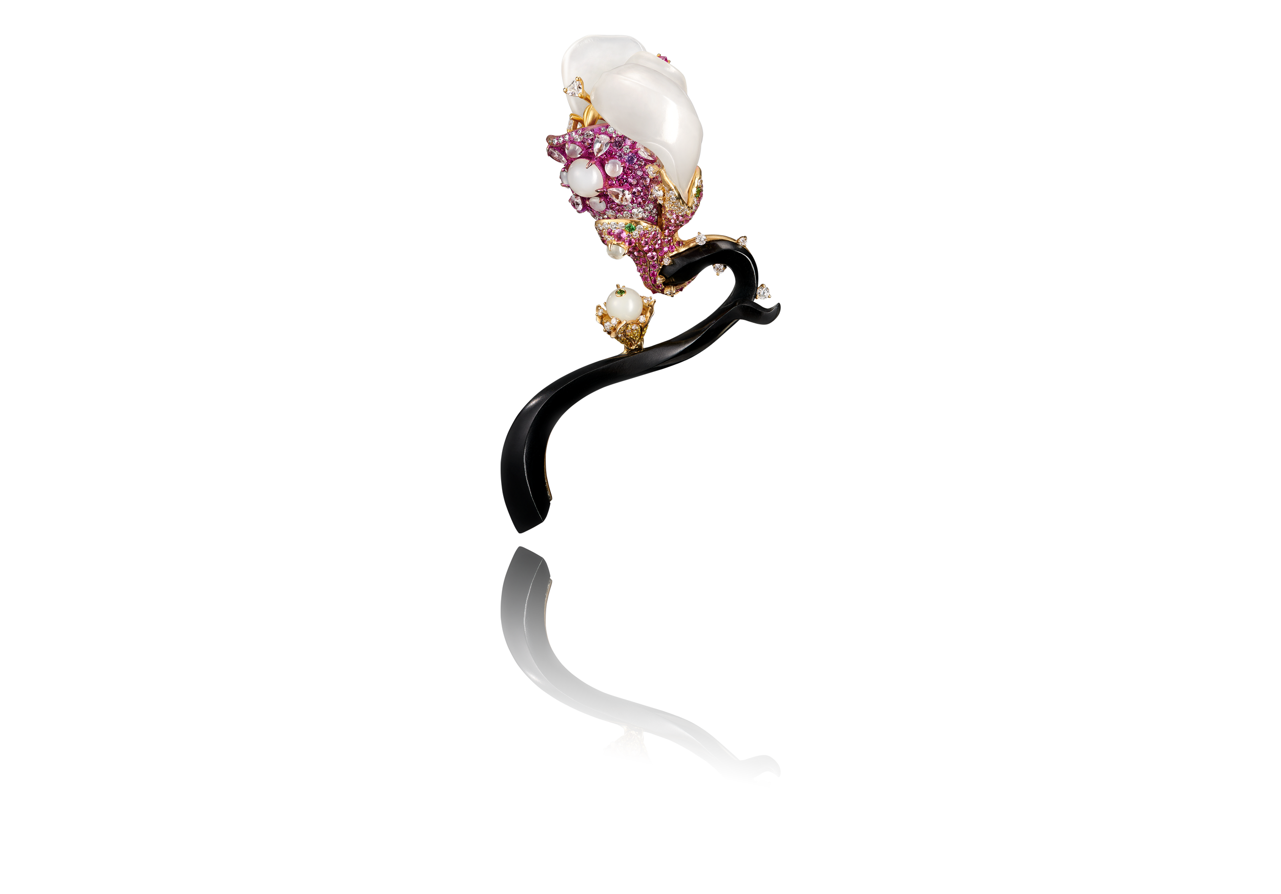 The stem is sculpted from black Hetian jade into an S-shaped curve. The petals are crafted from white Hetian jade and set with pink and white diamonds.